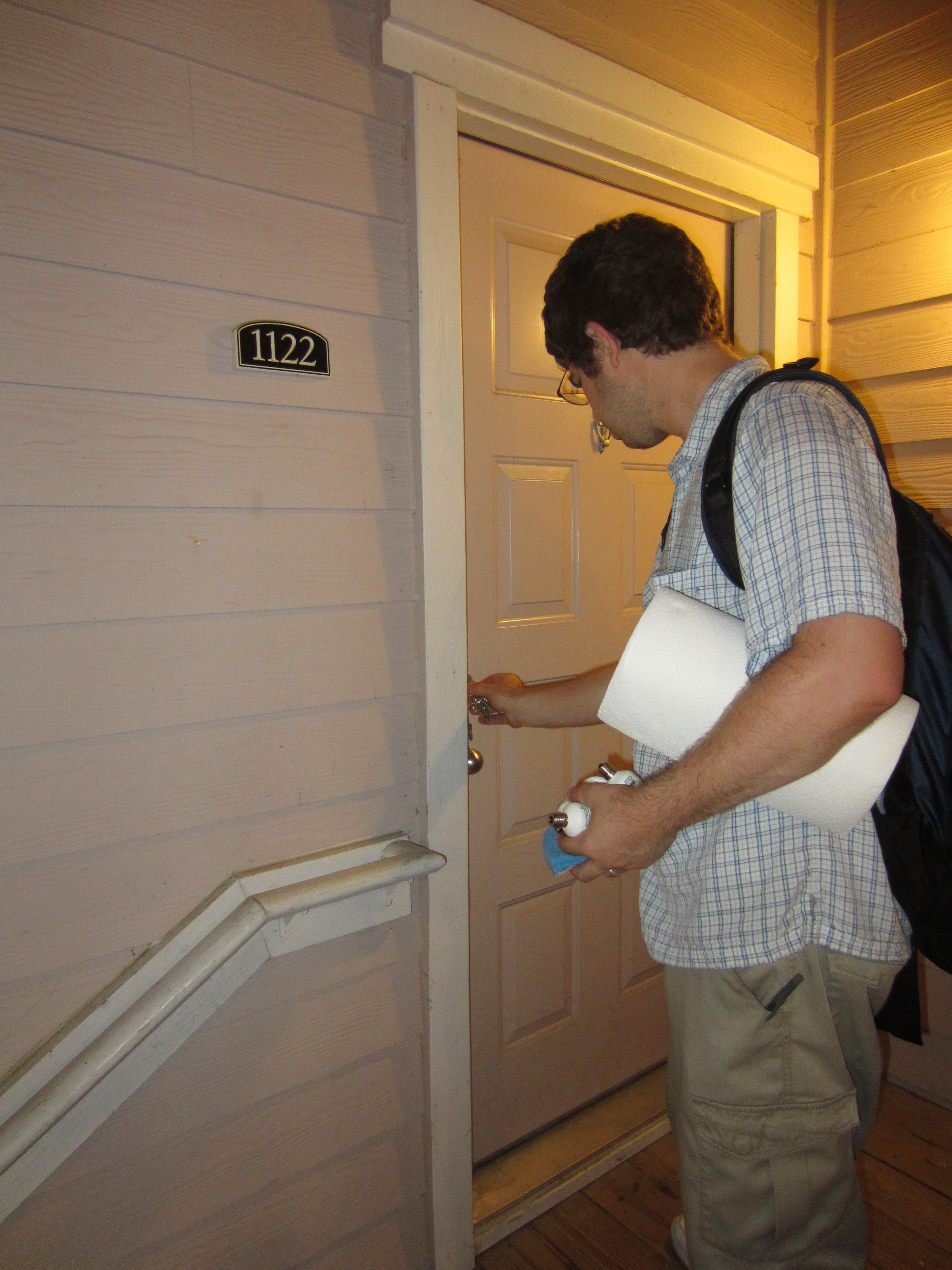 Kyle locking up our apartment for the last time!