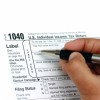 1040-with-hand